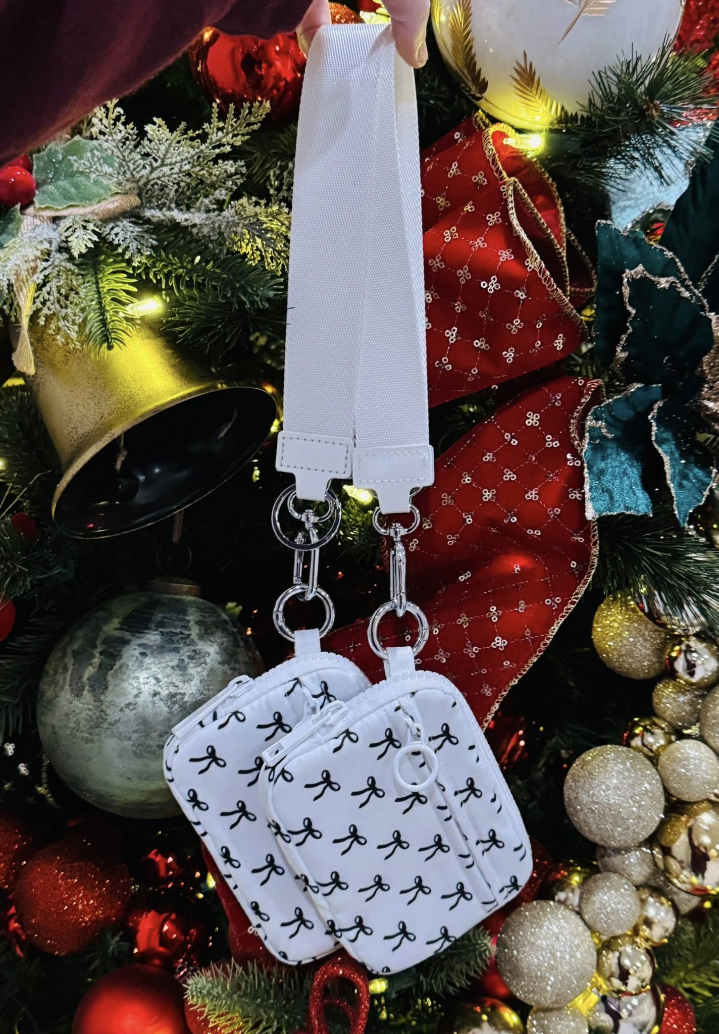 592729596_25833614172891247_8862489104115524180_n Black Bow Wristlet - Image 1