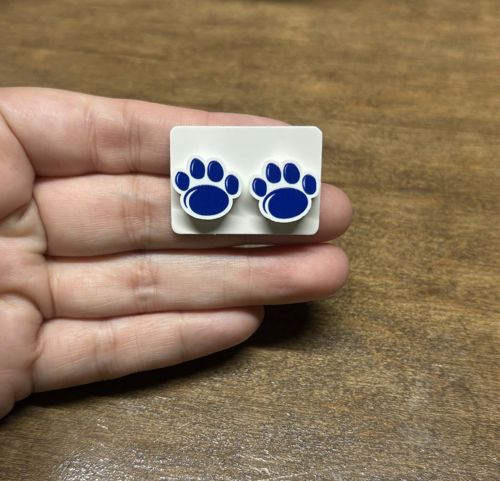804acda5-a700-42b9-9b21-9e2b4e9def85 Paw Studs - Image 1